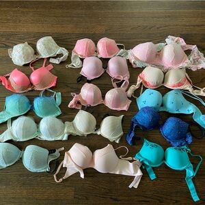 15 Victoria’s Secret bras size 34B, all like new or gently used.